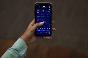 Celular com aplicativo TradeMap