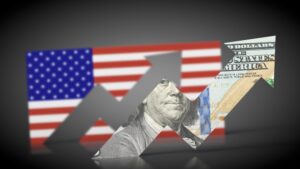 Bandeira dos Estados Unidos e nota de dólar; inflação subindo