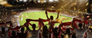 Imagem de torcedores em um campo de futebol durante a Copa do Mundo